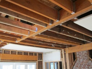 Here you can see the extent of floor joist work required running across the length of the living room ceiling