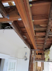 Massive floor joist spanning the length of the media and dining rooms