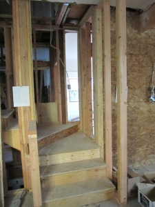 New stairway leading to the upstairs room.  4" wider to make code.