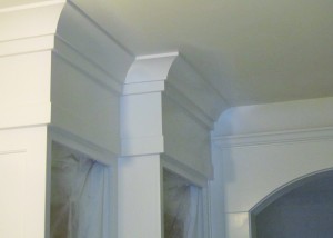 Cabinet frieze transition to the archway.  Love it.